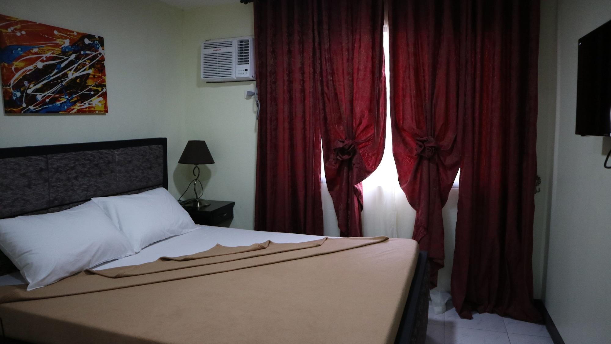 Doniti Suites And Events Place Мандалуйонг Экстерьер фото